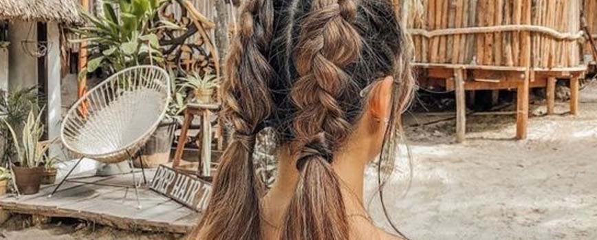 Dos trenzas en pelo largo