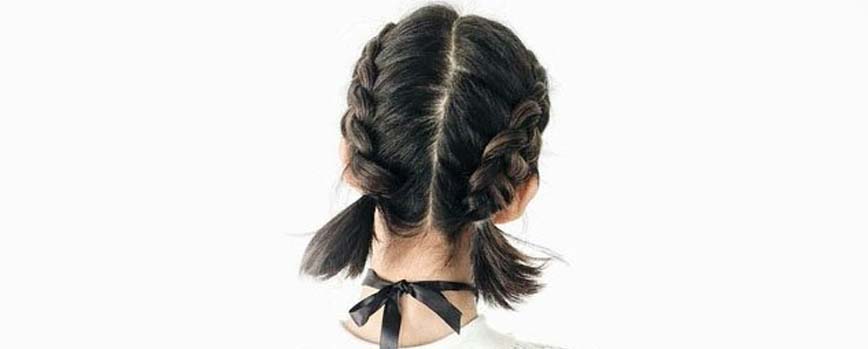 Dos trenzas de boxeadora o boxer braids
