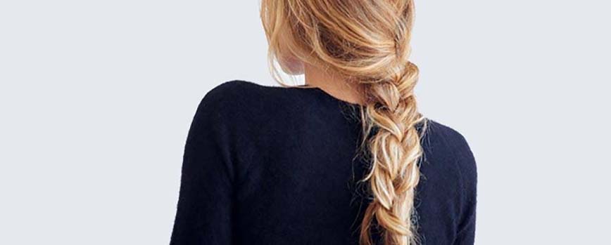 Trenza baja con pelo recogido