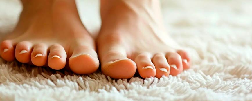 Síntomas de la dishidrosis en los pies