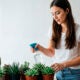 Woman watering her succulents