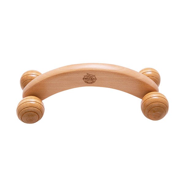 Masaje con rodillo de madera sales